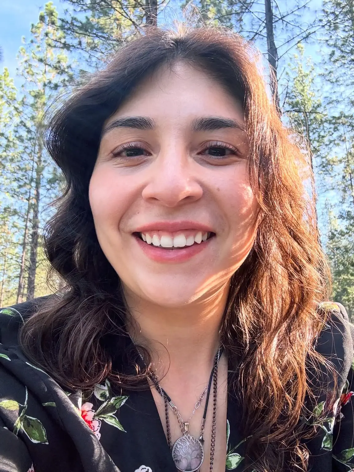 Michelle, a cat sitter in Montgomery County, Maryland, smiling outdoors